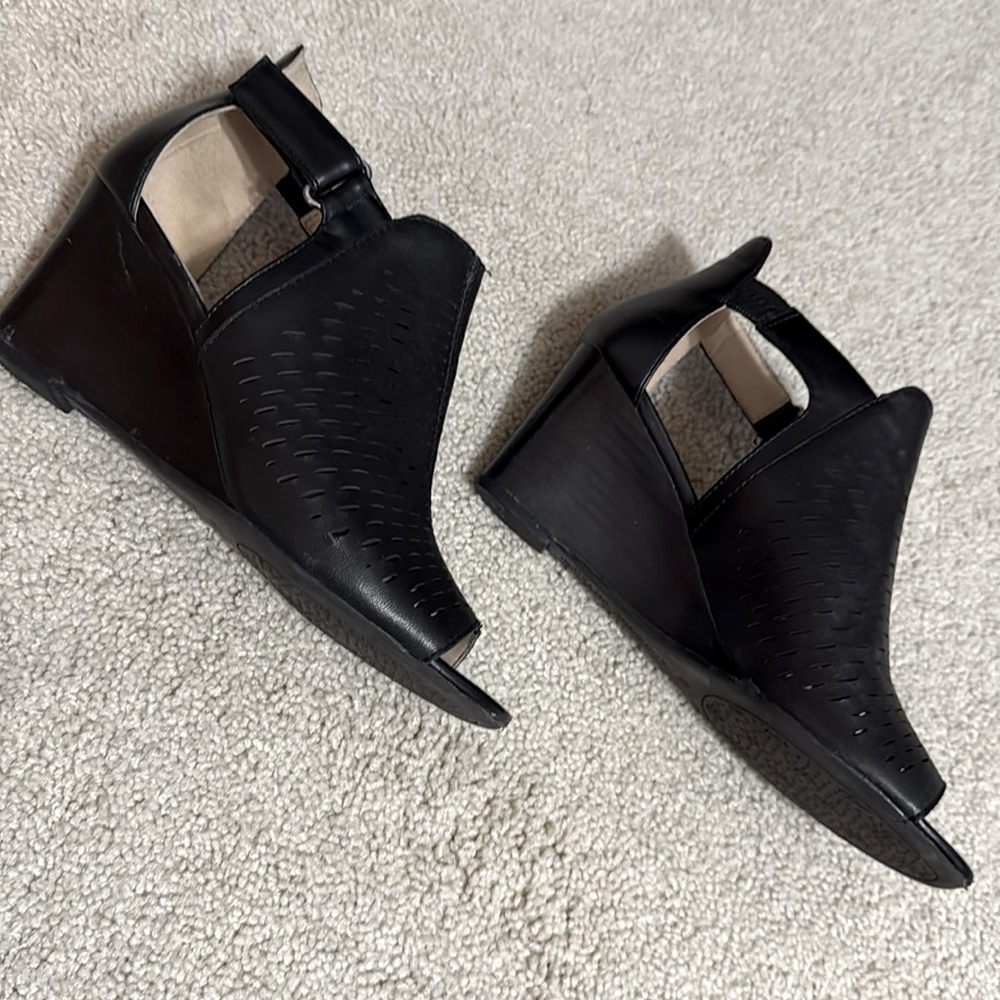 Black leather wedge sandals with cut out design